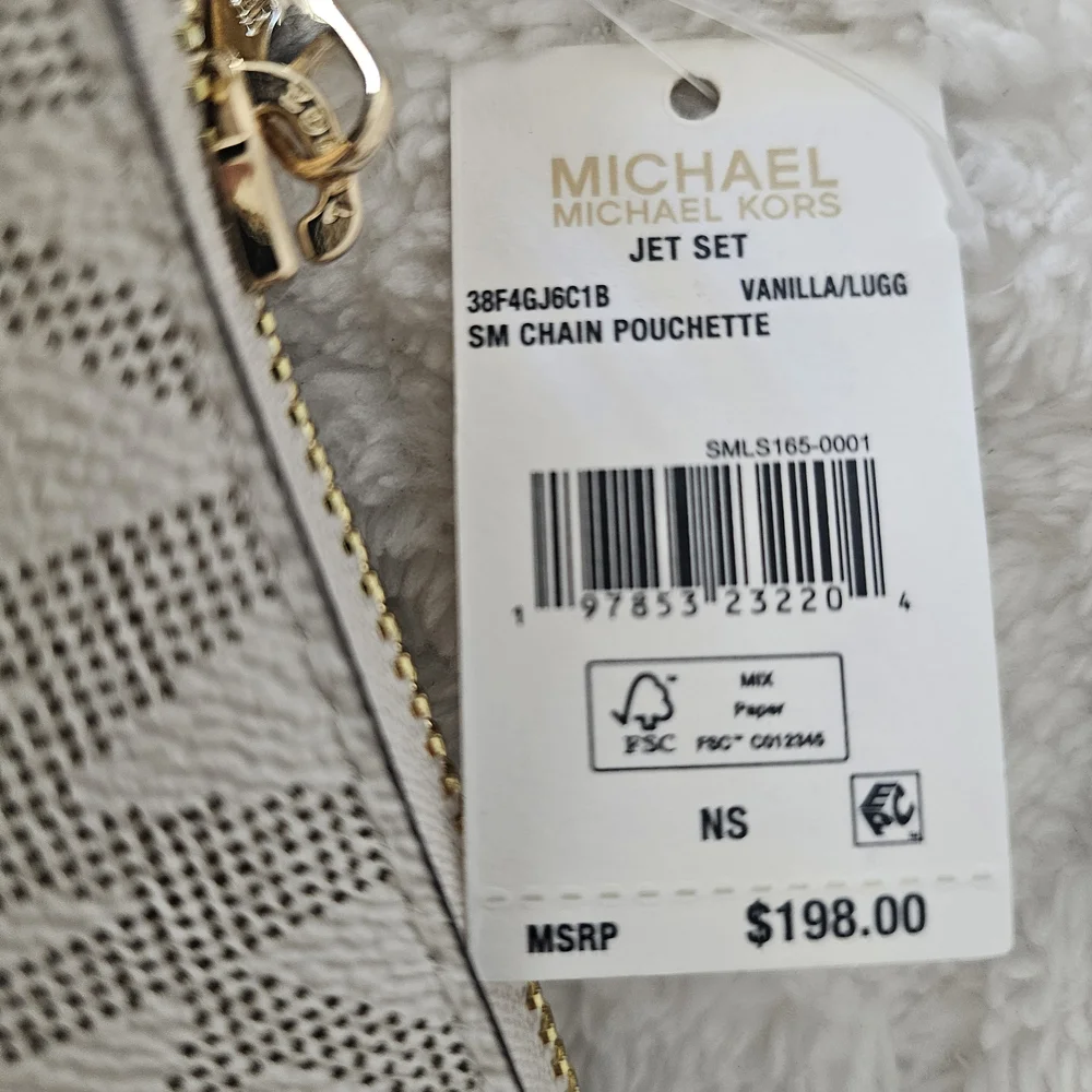 This is‎ a Michael Kors Jet Set Small Chain Pouchette in vanilla/lugg color.